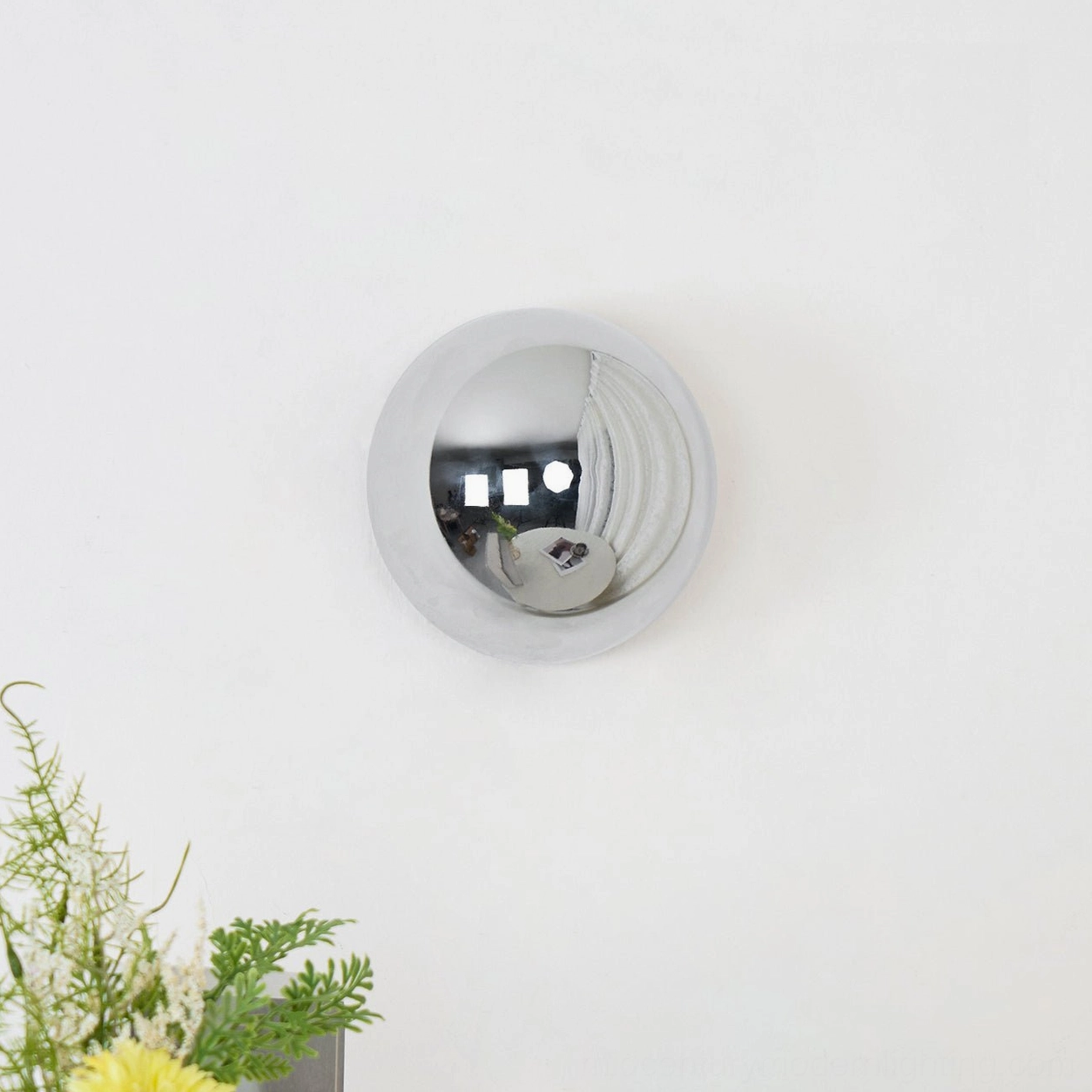 Minimalist chrome sphere wall lamp with convex mirror surface and slim frame design