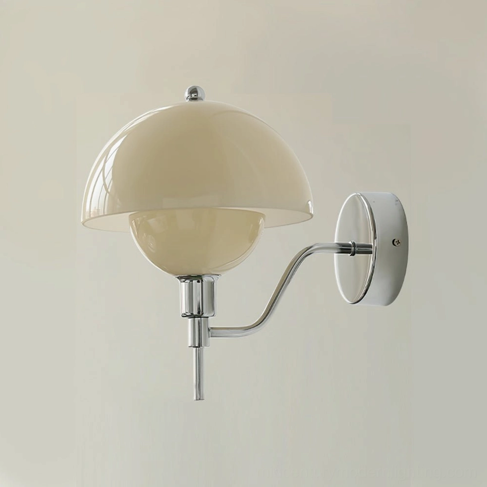 Chrome and cream anchored orb wall lamp mounted showing sophisticated neutral color palette and sculptural form