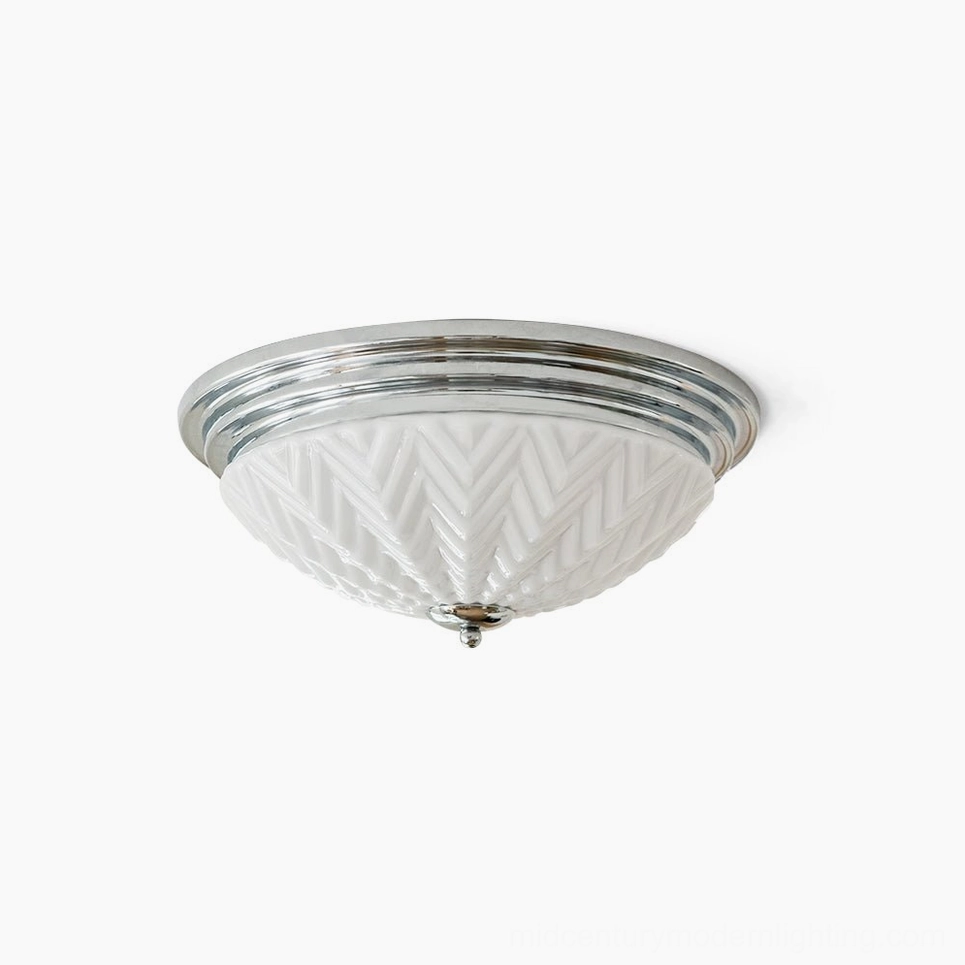Chrome flush mount ceiling lamp with frosted chevron textured glass shade, polished metal trim, front top close-up studio view