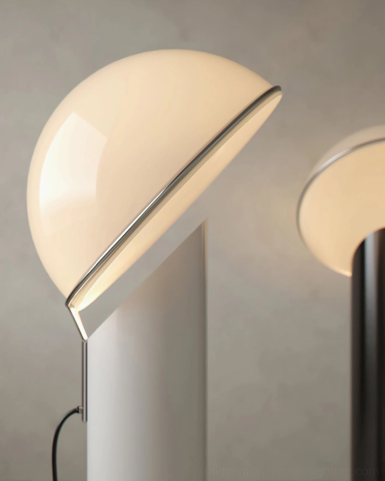 Ciot floor lamp front view showing polished black base and pristine white dome luminaire