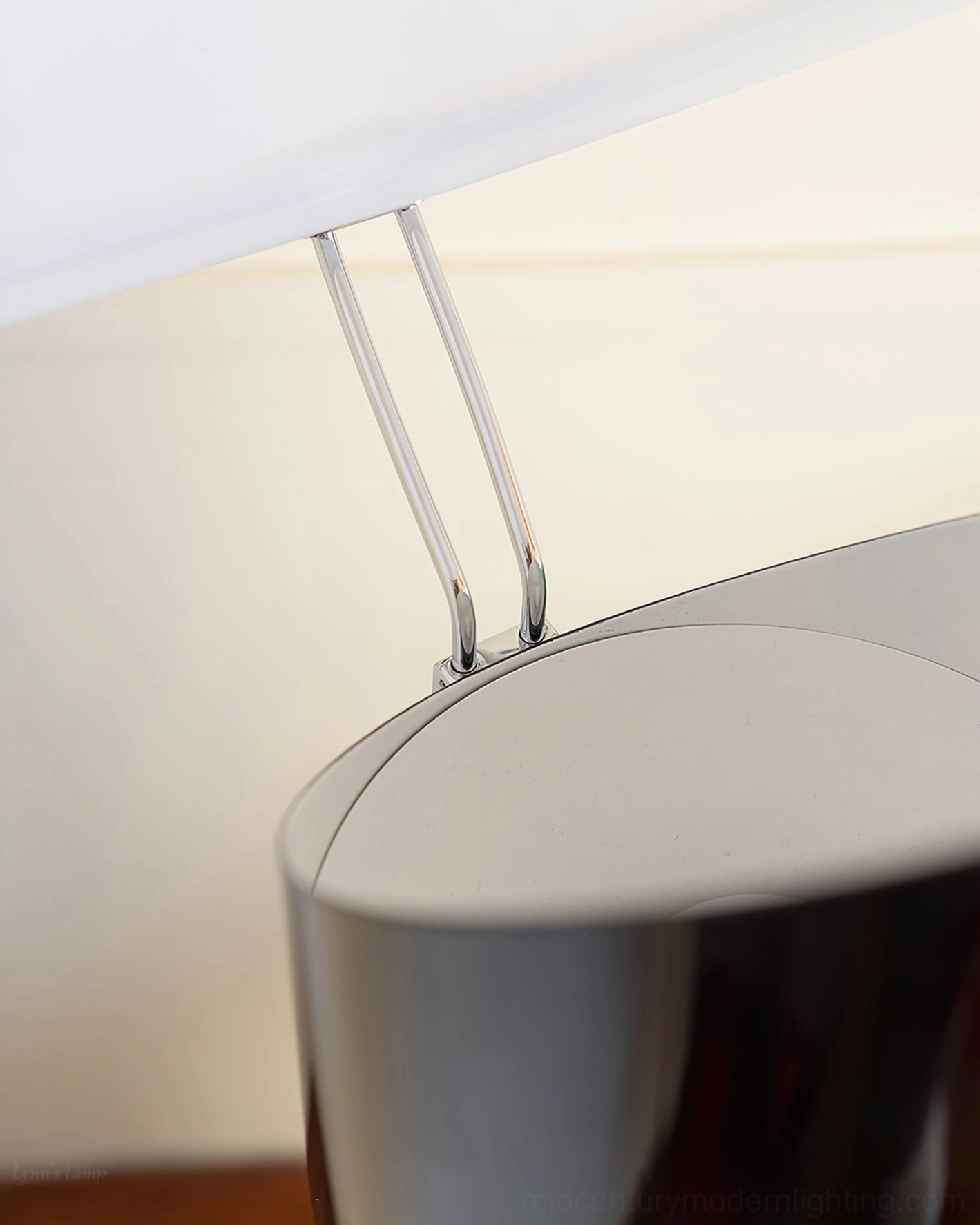 Ciot floor lamp in contemporary interior, black pole with large white dome, modern lighting solution