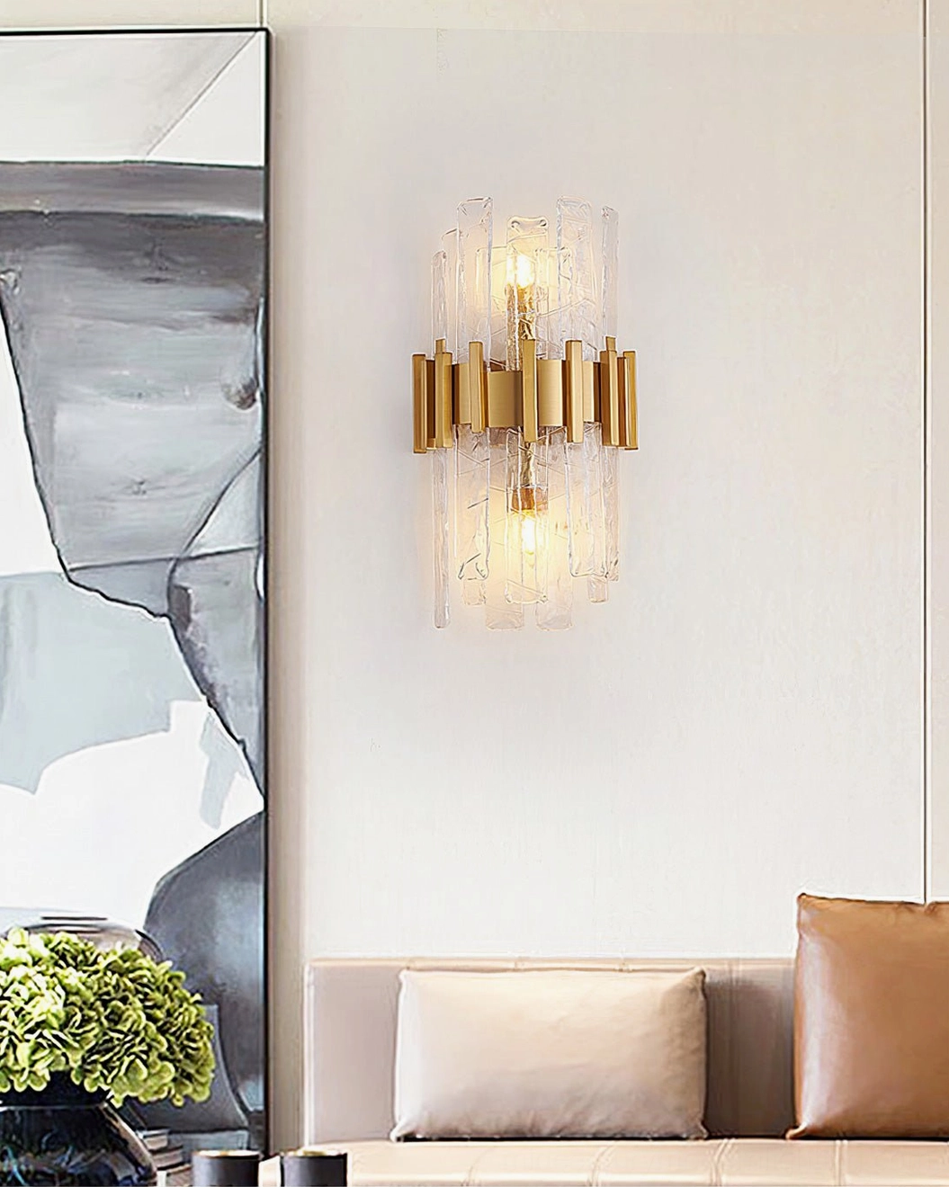 Ciro textured glass wall lamp with gold metalwork, angled product photography