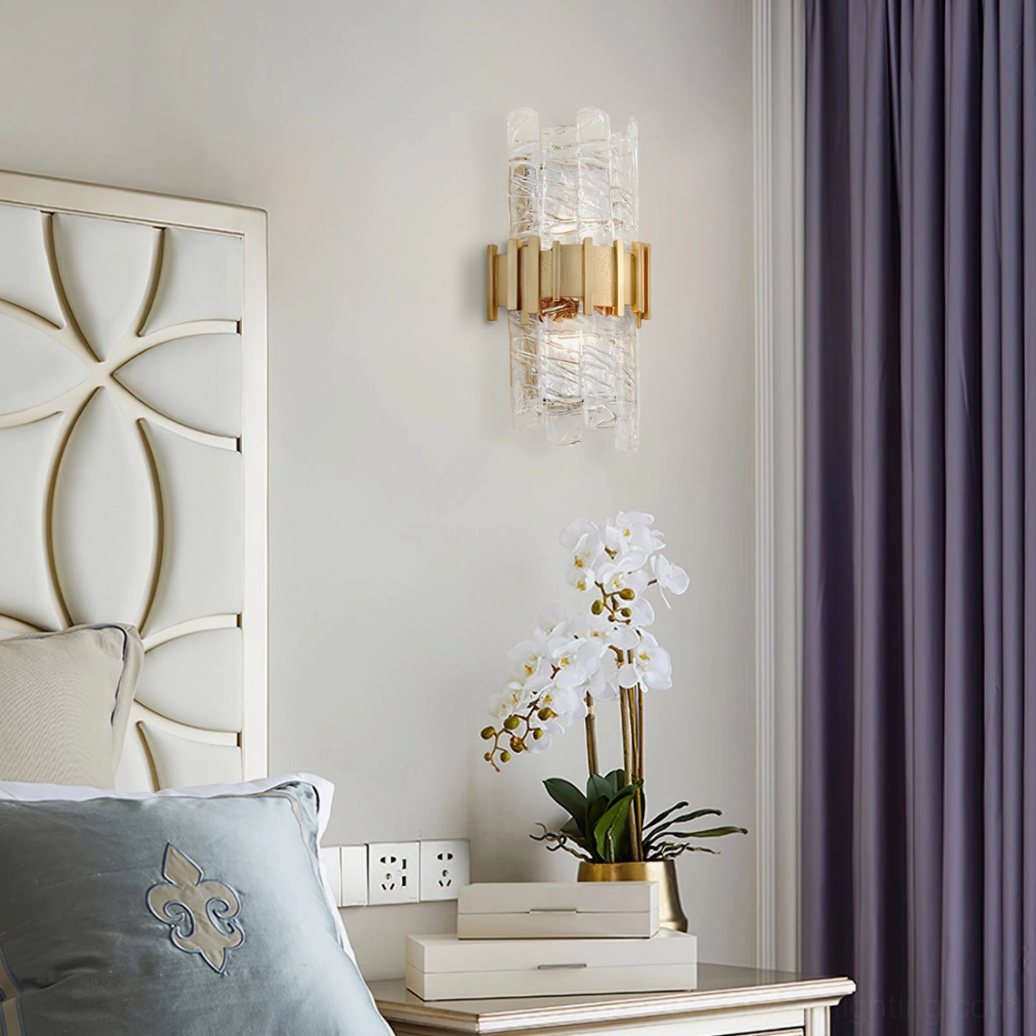 Wall-mounted sconce showing architectural simplicity and crafted glass texture
