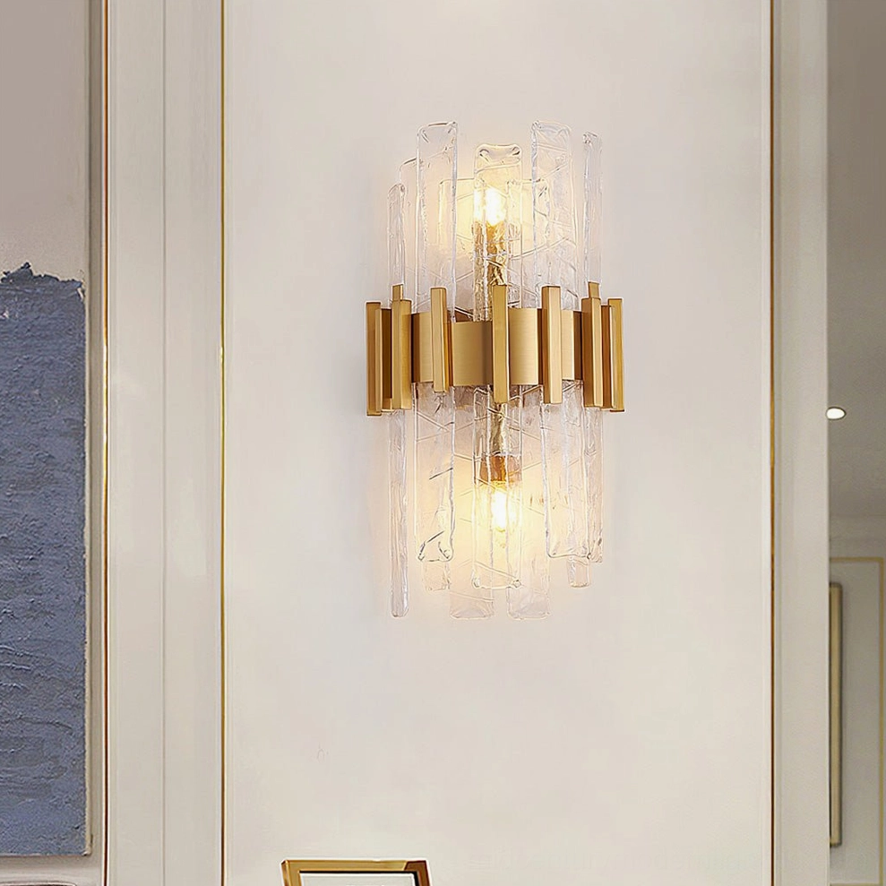 Contemporary wall sconce side profile showing fluted glass panels and brushed gold metalwork