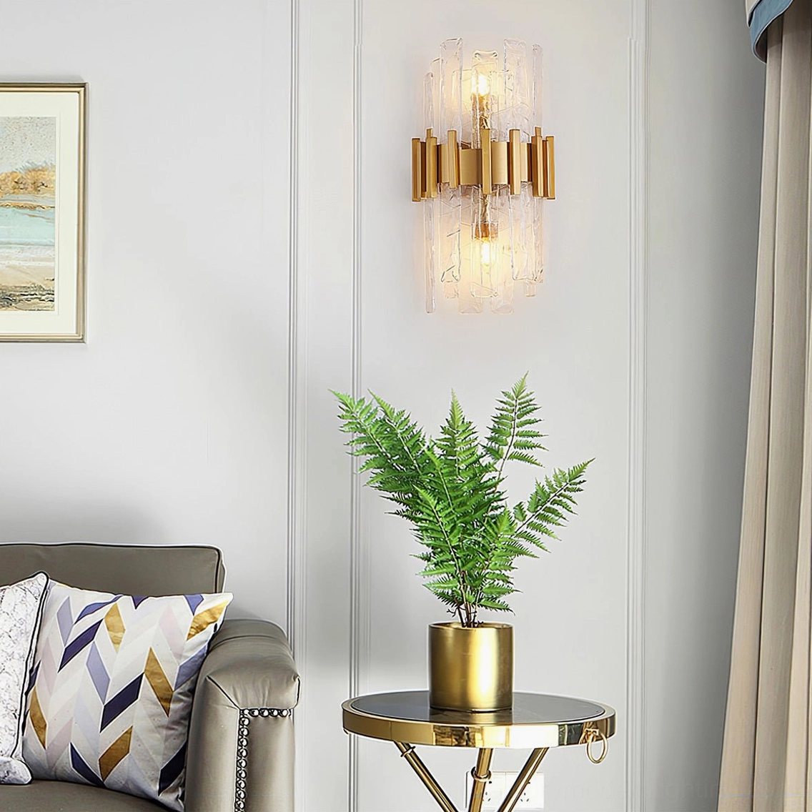 Ciro modern wall sconce in gold and clear textured glass, full product view