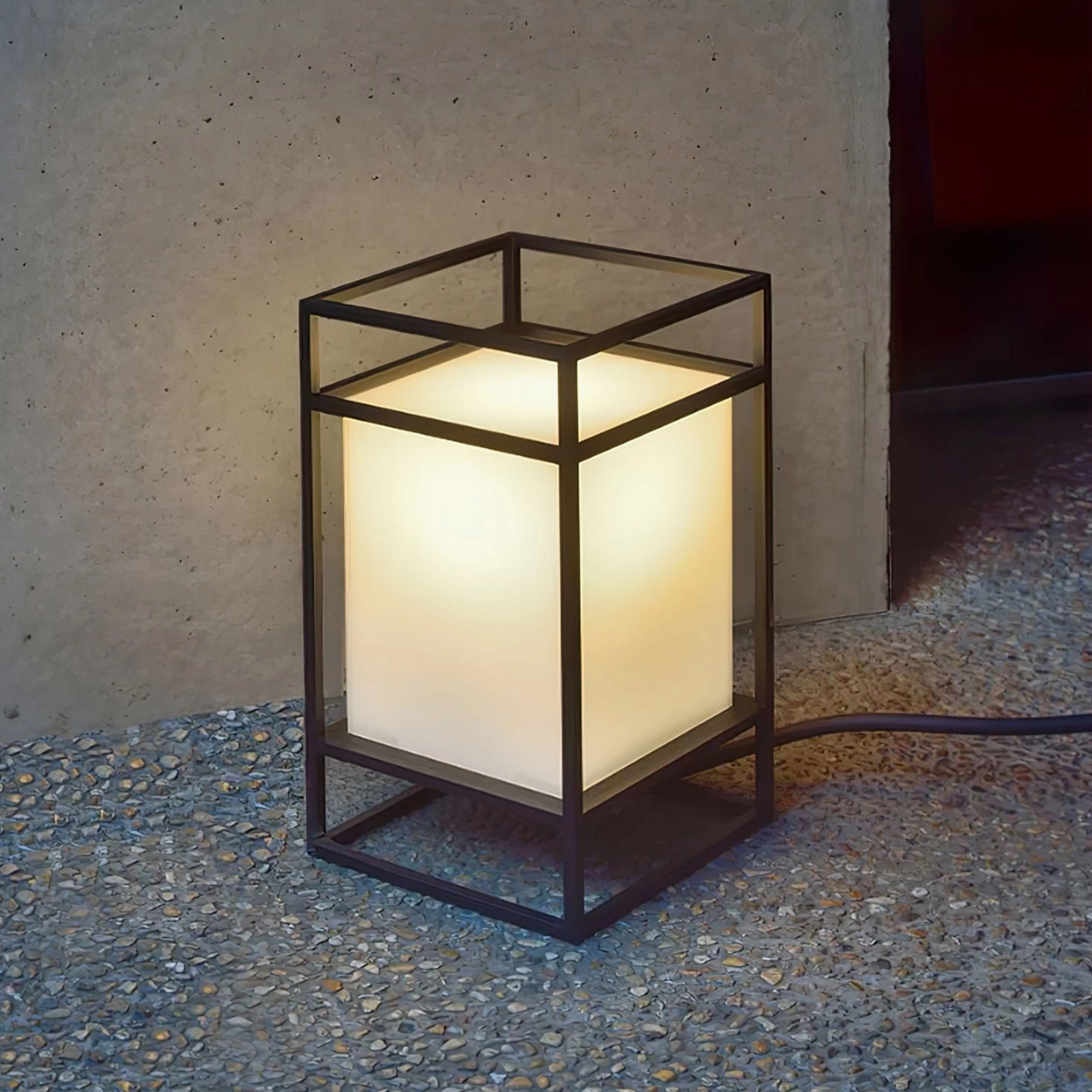 Cleo short square outdoor lantern gravel patio visible power cable