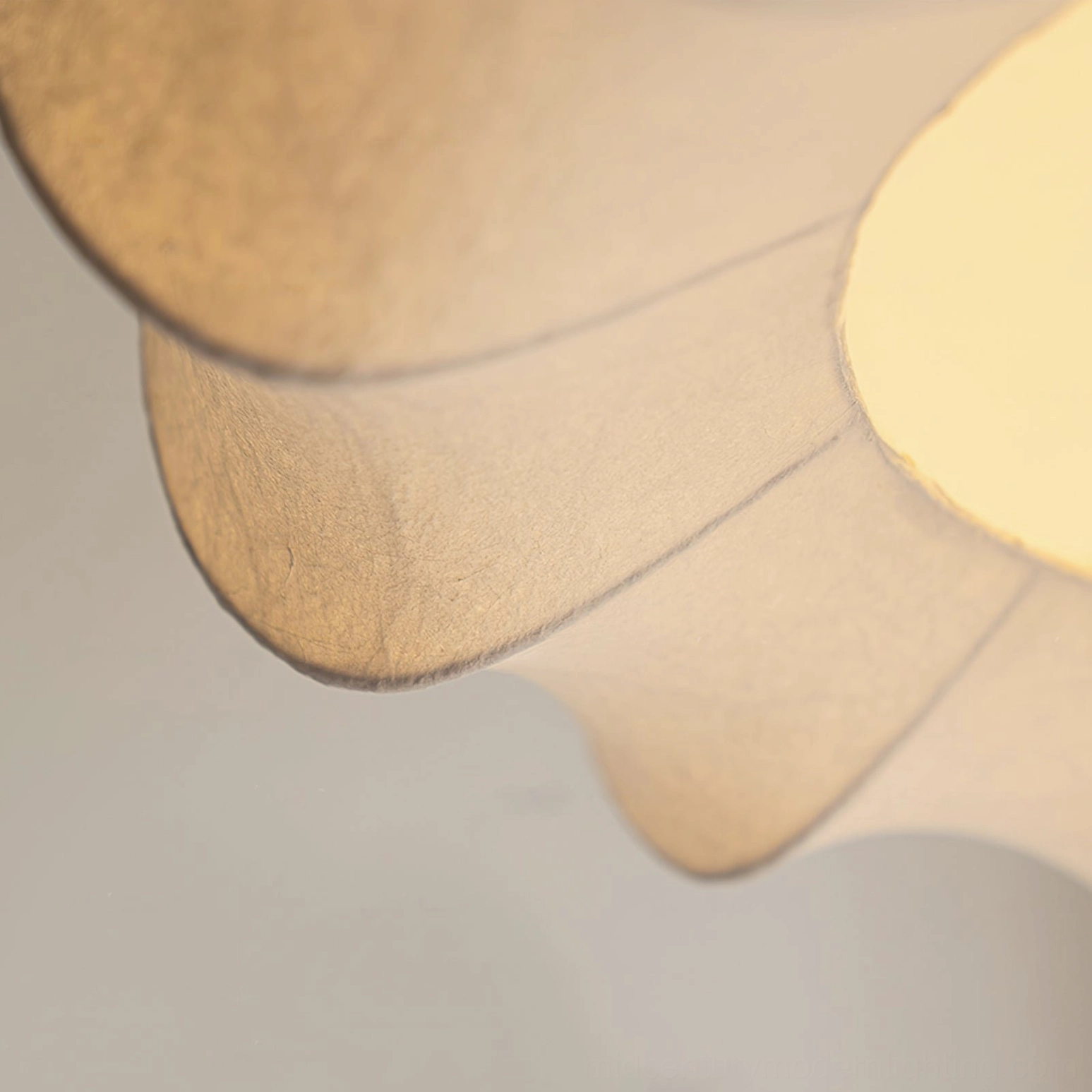 Cocoon silk pendant lamp overhead hanging view showing full sculptural form and light diffusion in interior space