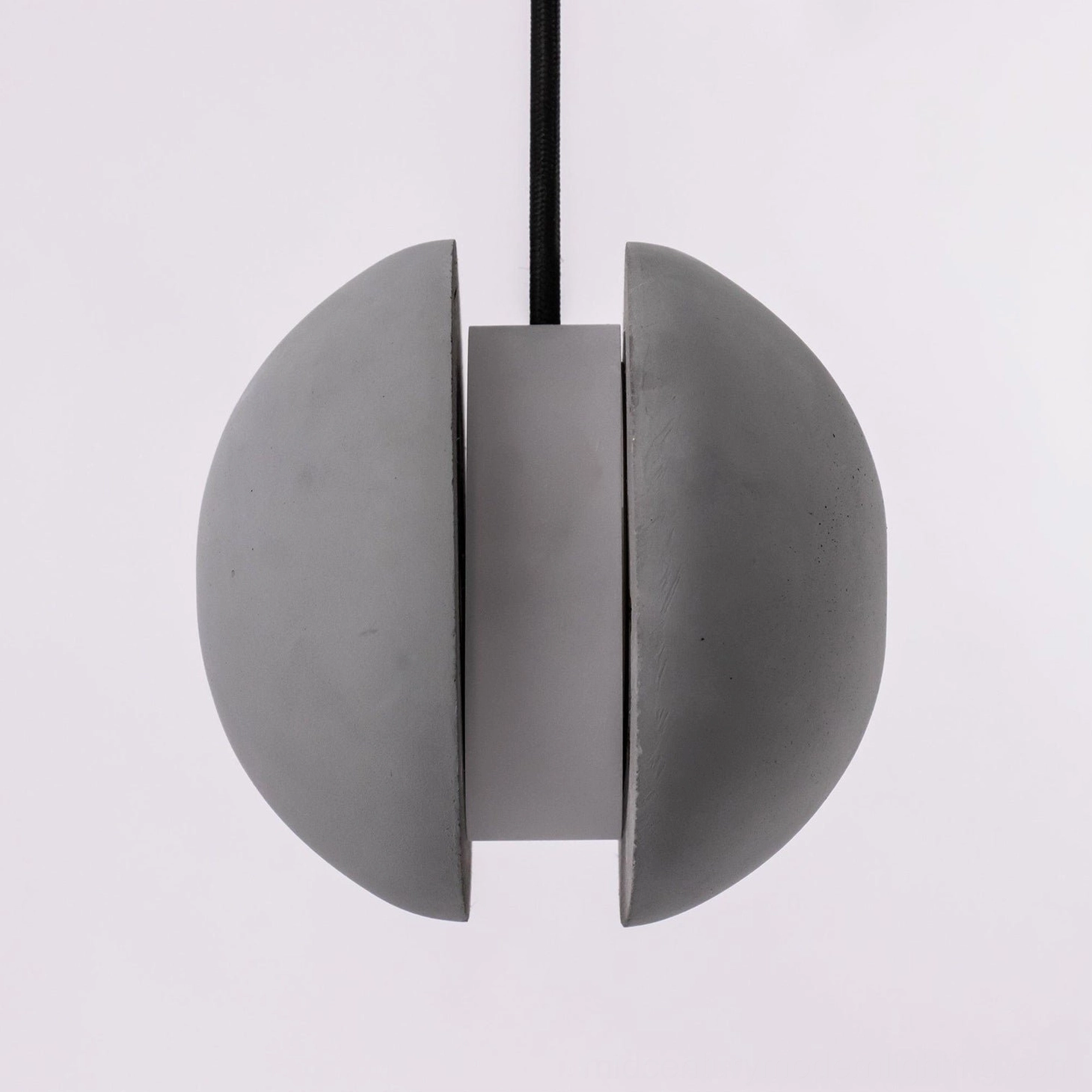 Concrete pendant lamp group display showing multiple models and design options available