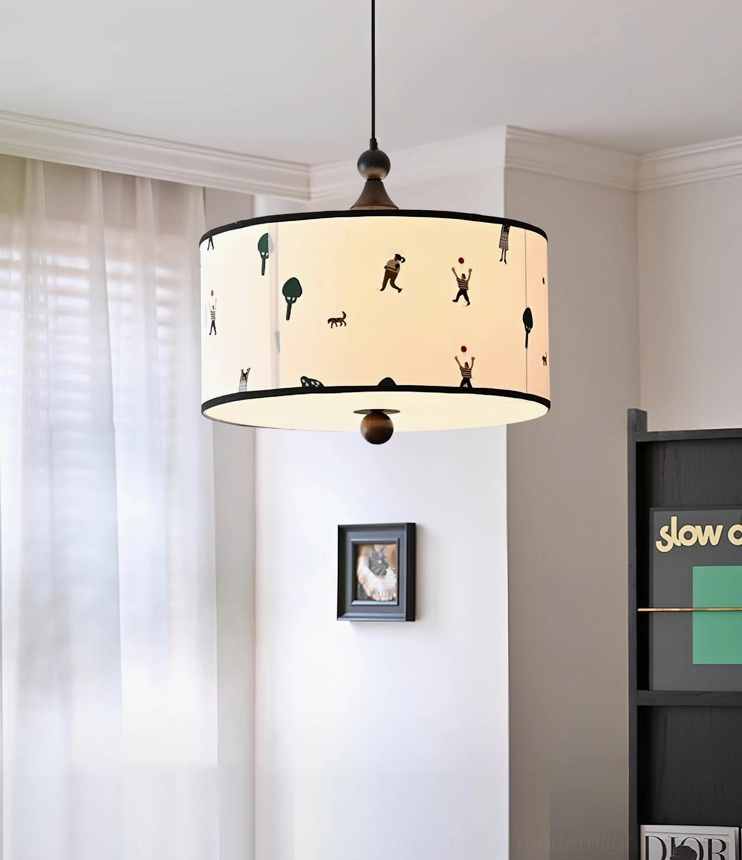 Congo pendant light in bright living space with sheer curtains, warm neutral modern minimalist design, three-quarter overhead view