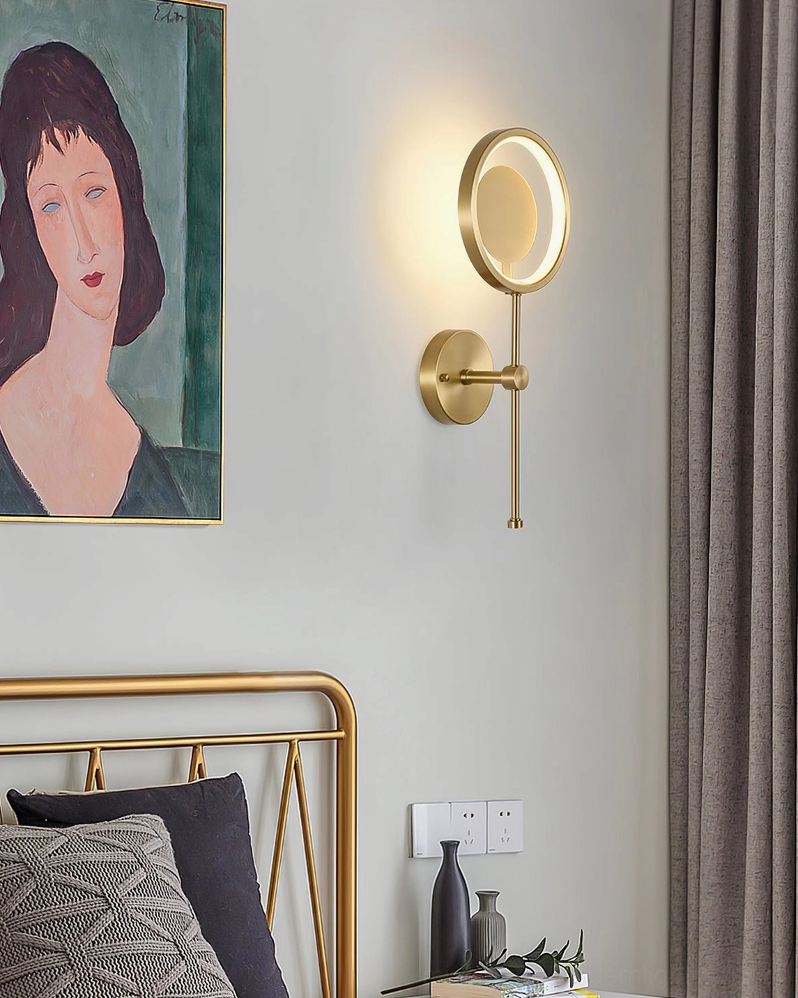 Contemporary bedroom nightstand area with modern black ring wall lamp providing ambient light
