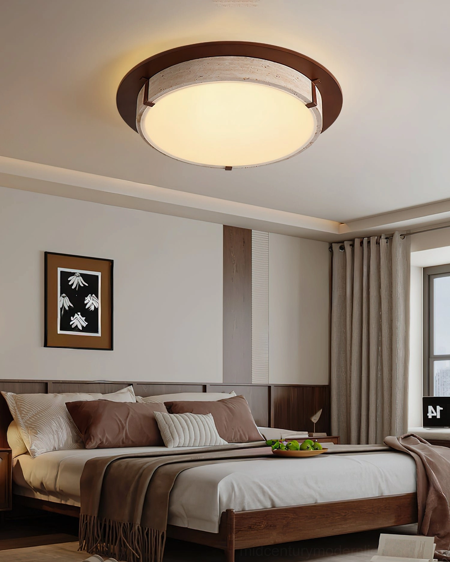 Contemporary ceiling light fixture glowing in modern bedroom with dark bedding and wooden headboard