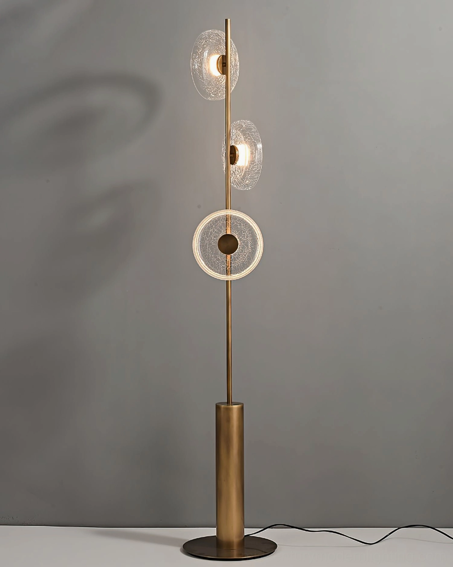 Contemporary floor lamp with hand-crafted crackle glass shades and brushed bronze metal frame construction