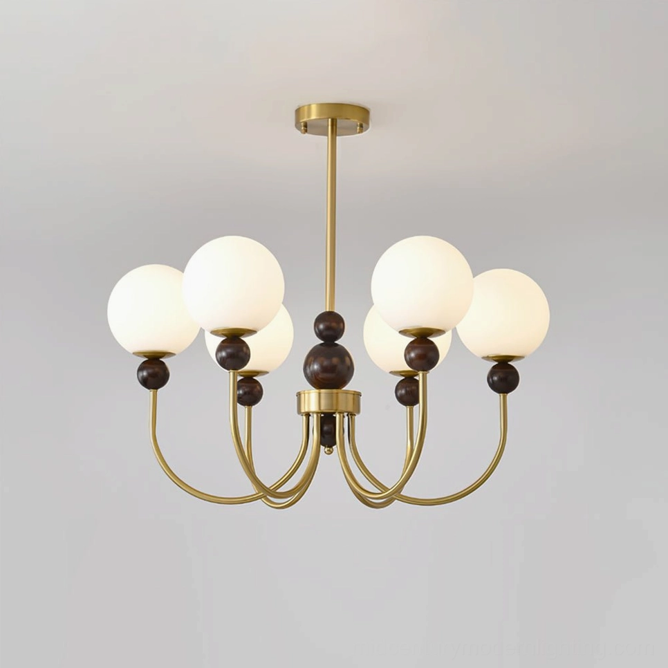Contemporary glass pendant chandelier with metal frame and frosted glass globes, low-angle front perspective