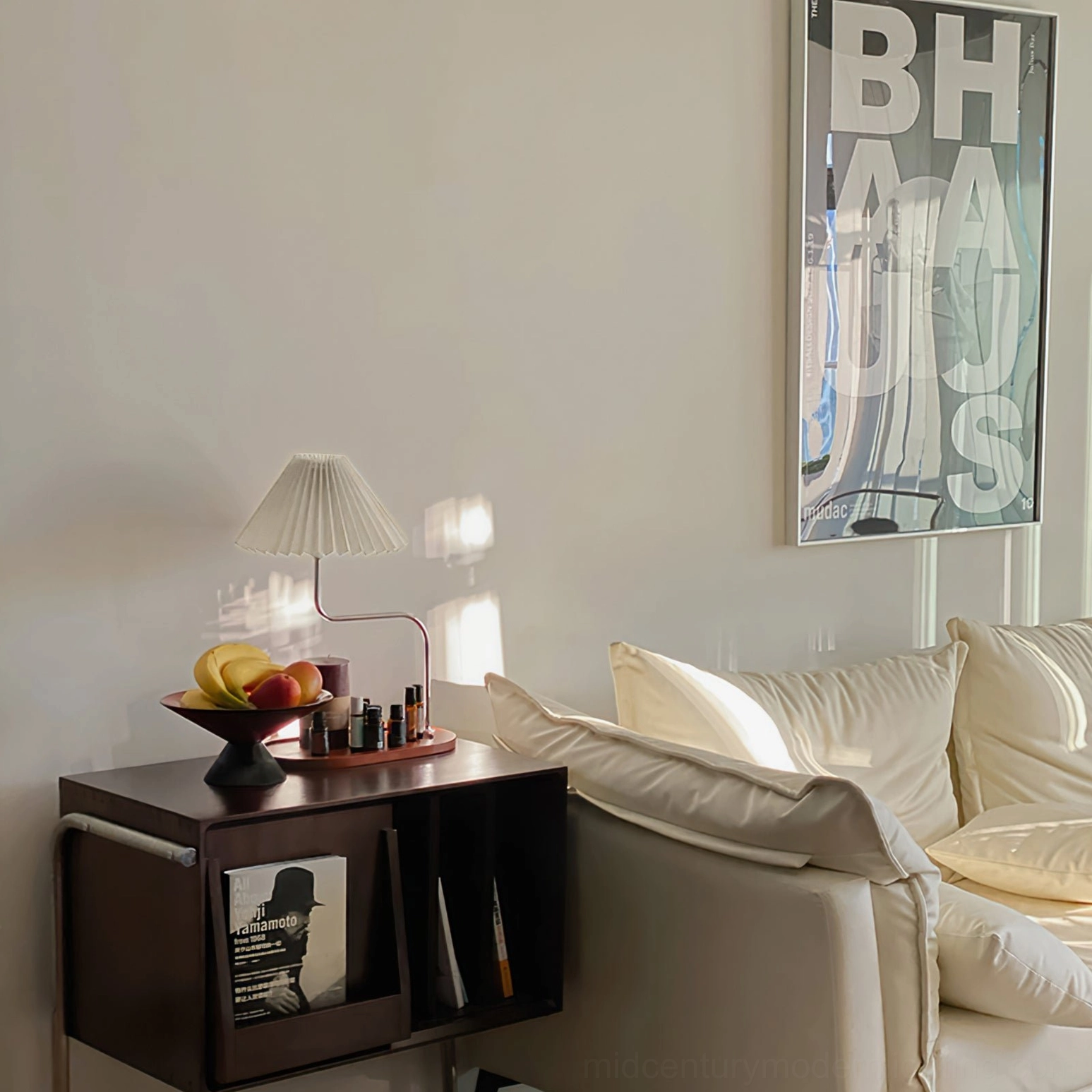 Contemporary mid-century modern table lamp design with chrome metal arm details
