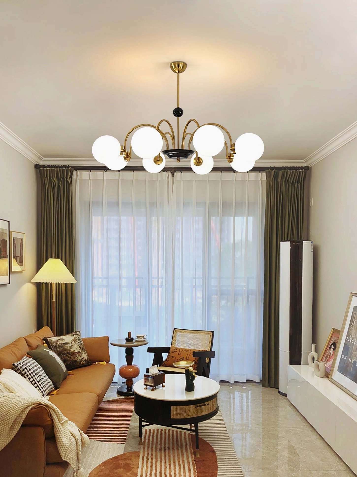 Modern multi-sphere glass chandelier fixture with contemporary metal frame and diffused lighting