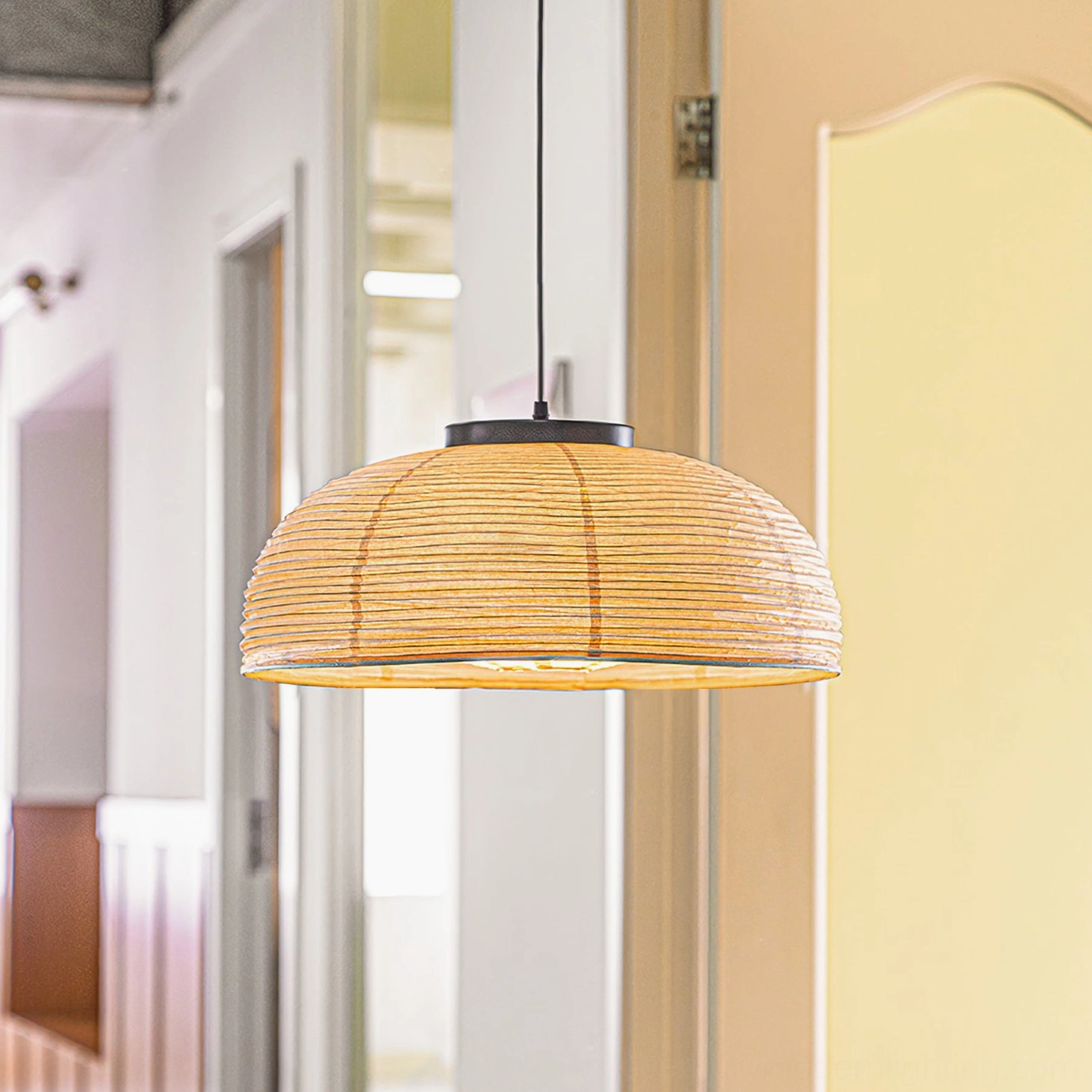 Contemporary paper pendant light in modern hallway – minimalist interior with beige glowing shade