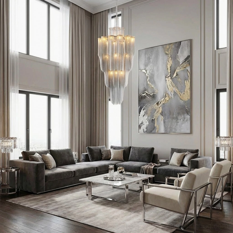 Contemporary tiered crystal chandelier in double-height modern living room with wall artwork