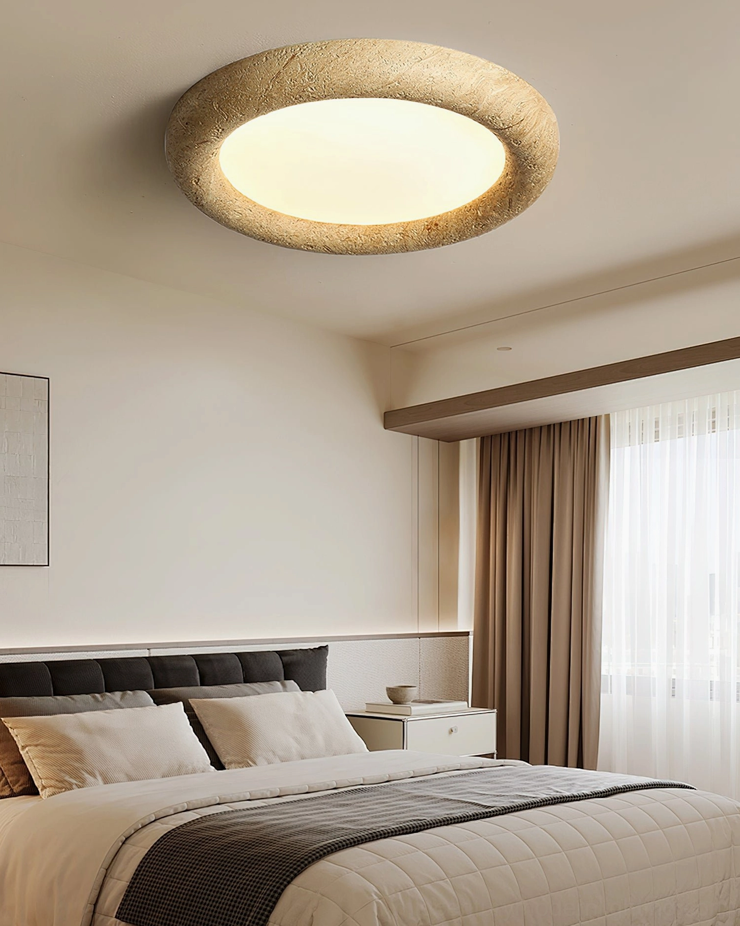 Cozy bedroom setting with ceiling light above dark upholstered headboard and floor curtains