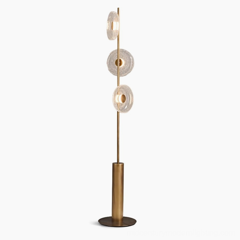 Crackle glass floor lamp with bronze base, full front view showing clear glass discs and metal frame in minimalist studio setting