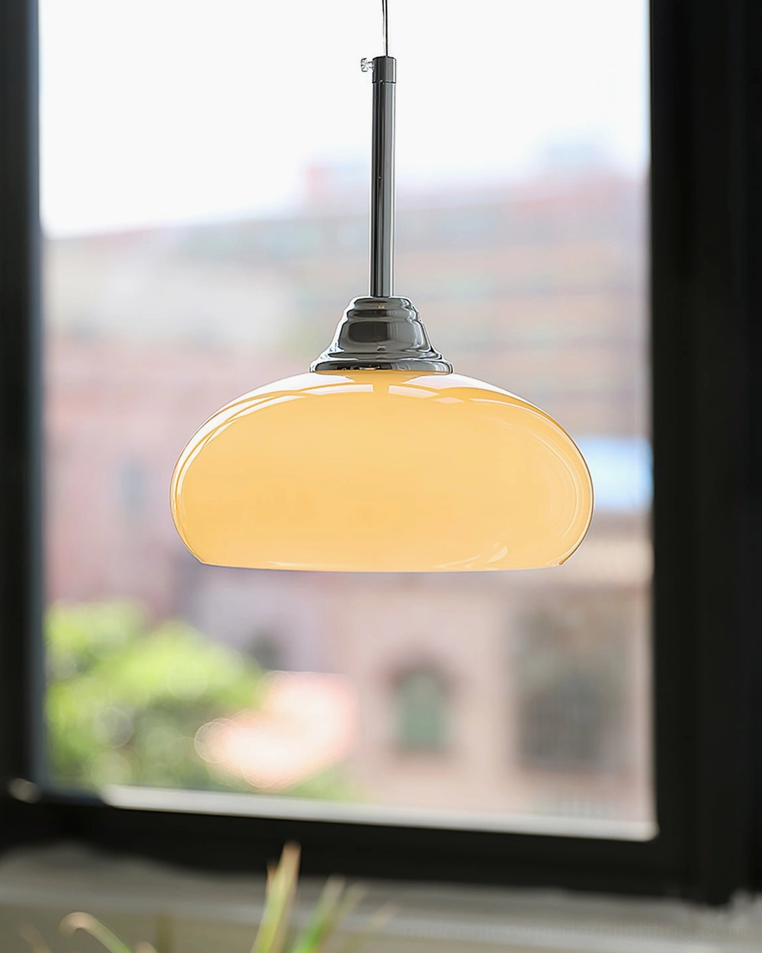 Bell Pendant Light with cream glass shade in mid-century modern styled room with vintage accents