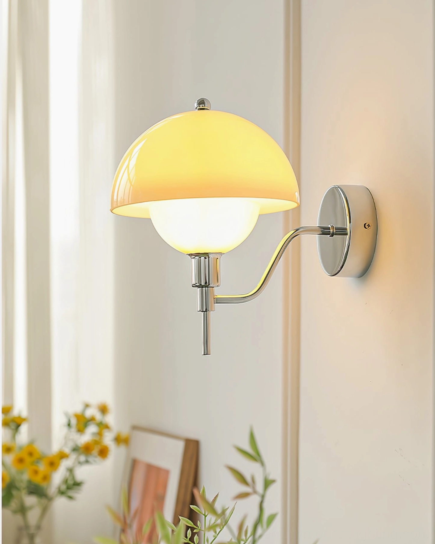 Anchored orb wall lamp in cream and metal finish for contemporary mid-century interior design