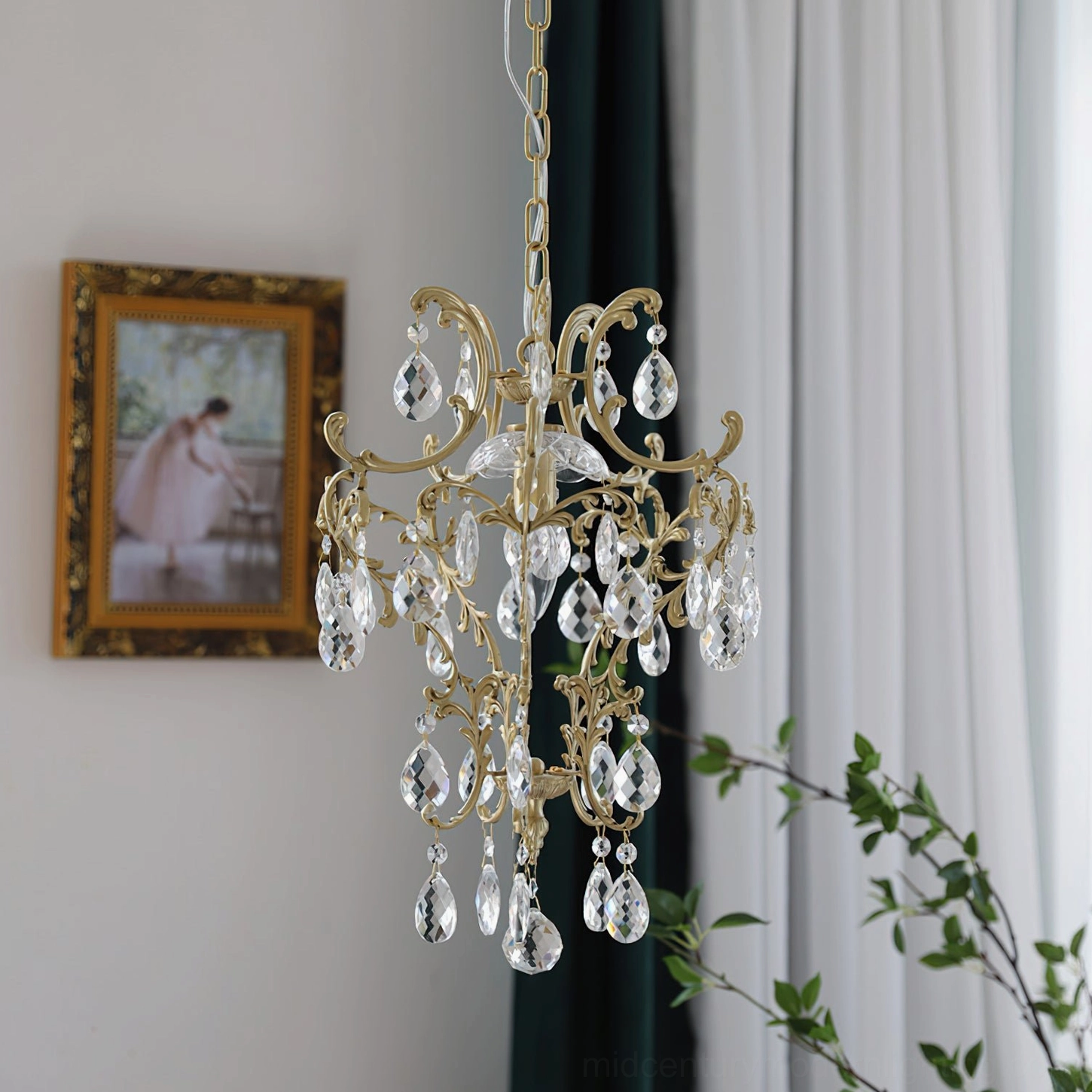 Creamy gold-frame birdcage pendant with delicate scroll design and abundant crystal teardrop accents in interior space