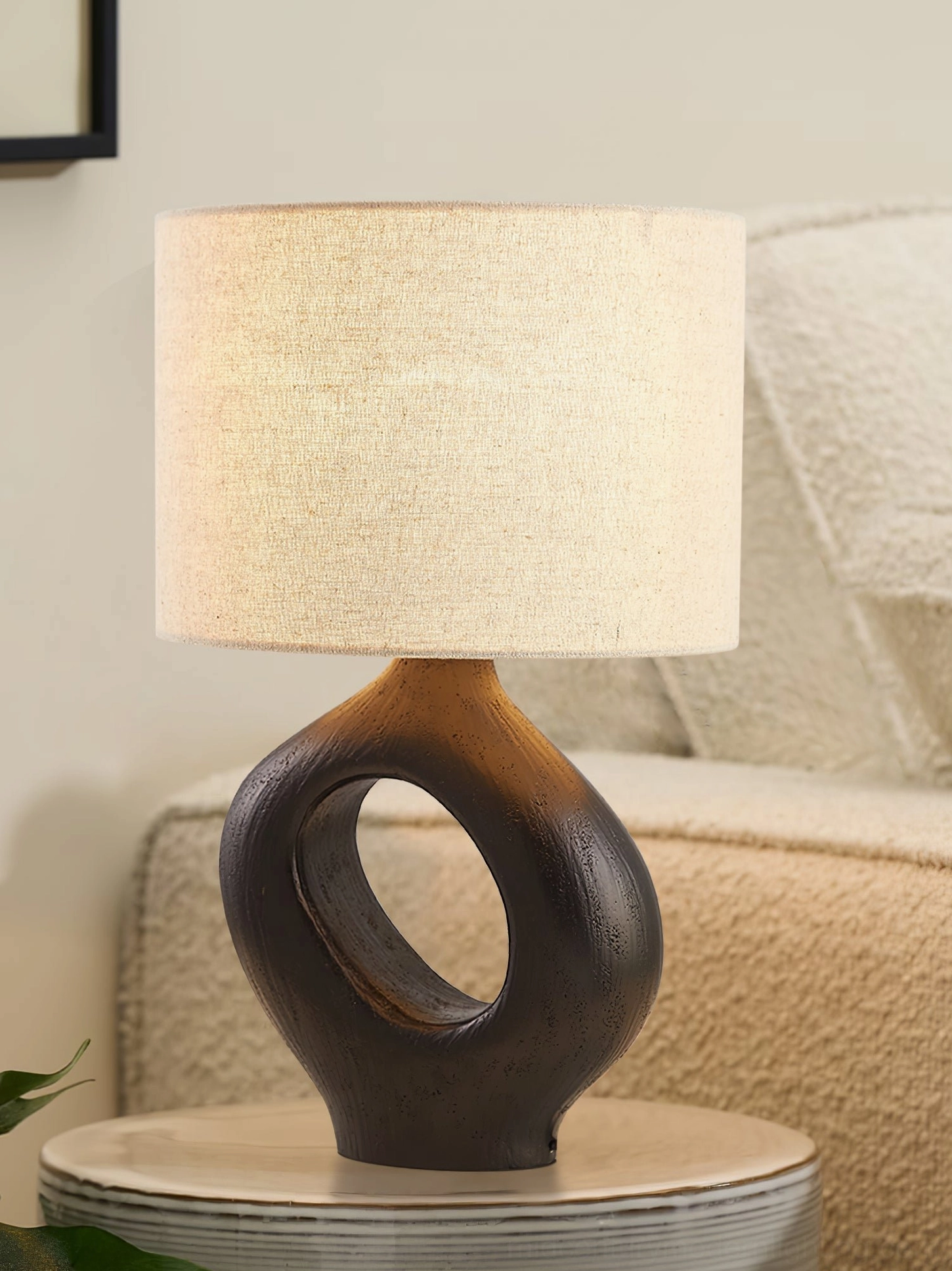 Sauce table lamp alongside curated interior accessories, handcrafted design for creative workspaces