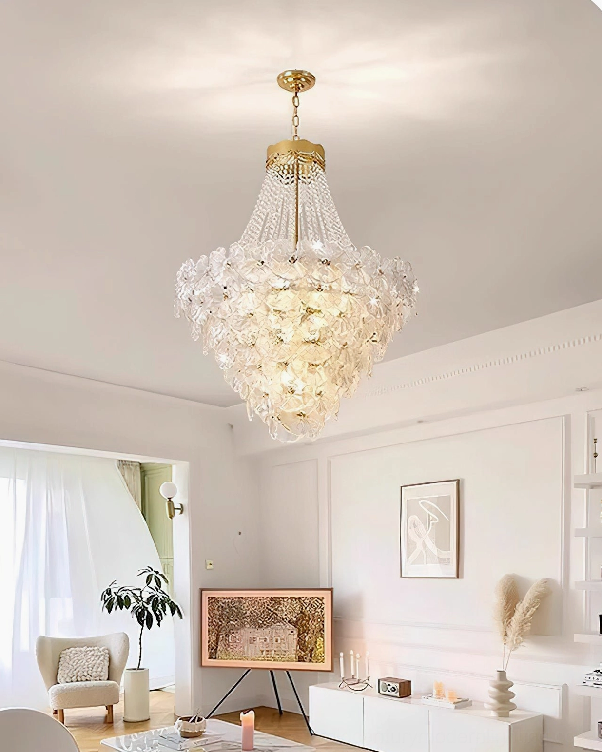 Crystal bead and frosted glass chandelier creating ambient glow in luxury dining and living room setting