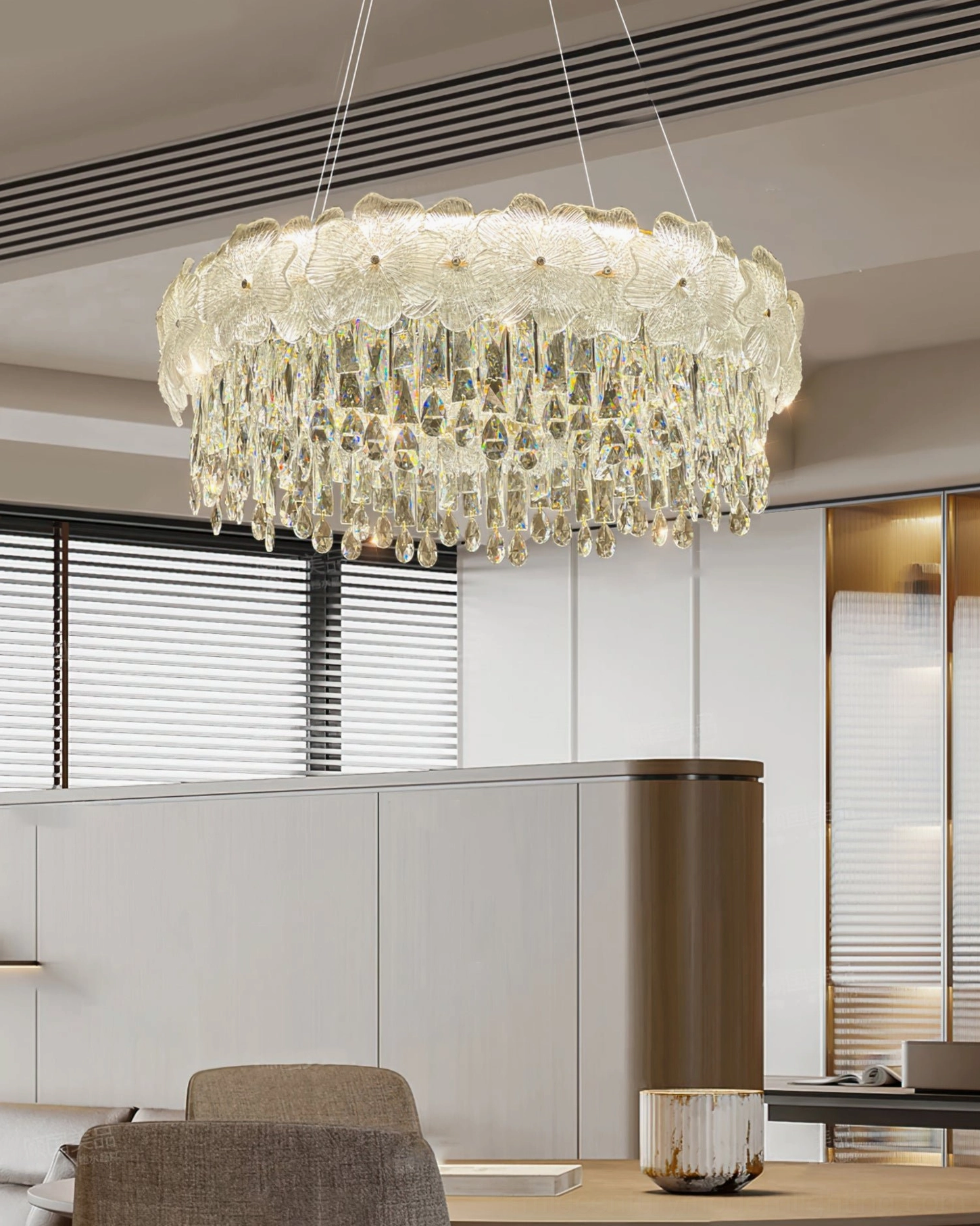 Crystal chandelier luxury dining room ambiance three-quarter view tiered droplets warm gold accents contemporary elegance