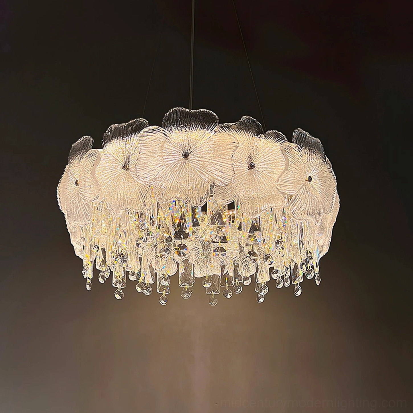 Crystal chandelier geometric design precision-arranged crystal petals and droplets creating dynamic light refraction patterns