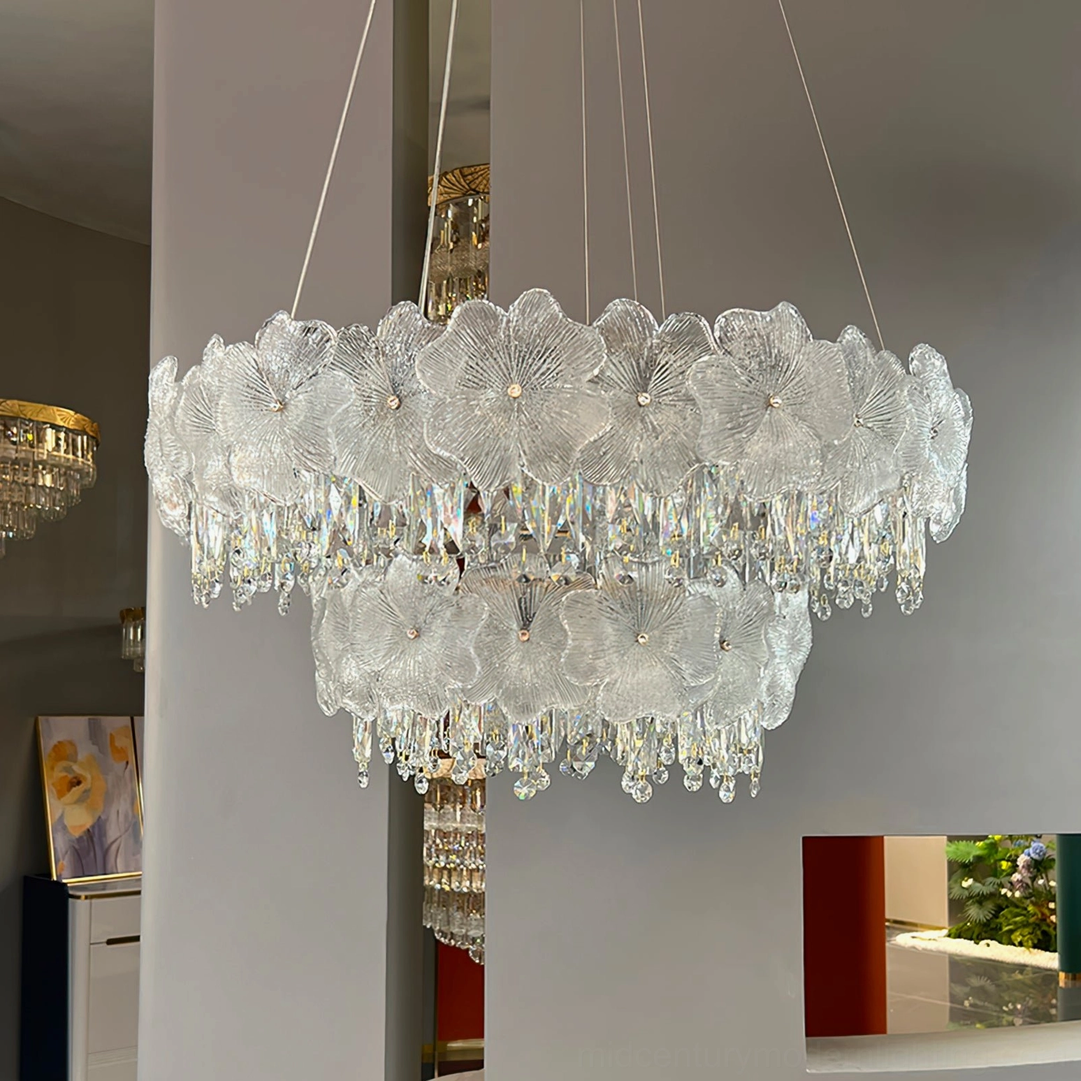Modern luxury crystal chandelier installation shot showing complete fixture assembly and premium stainless steel construction details