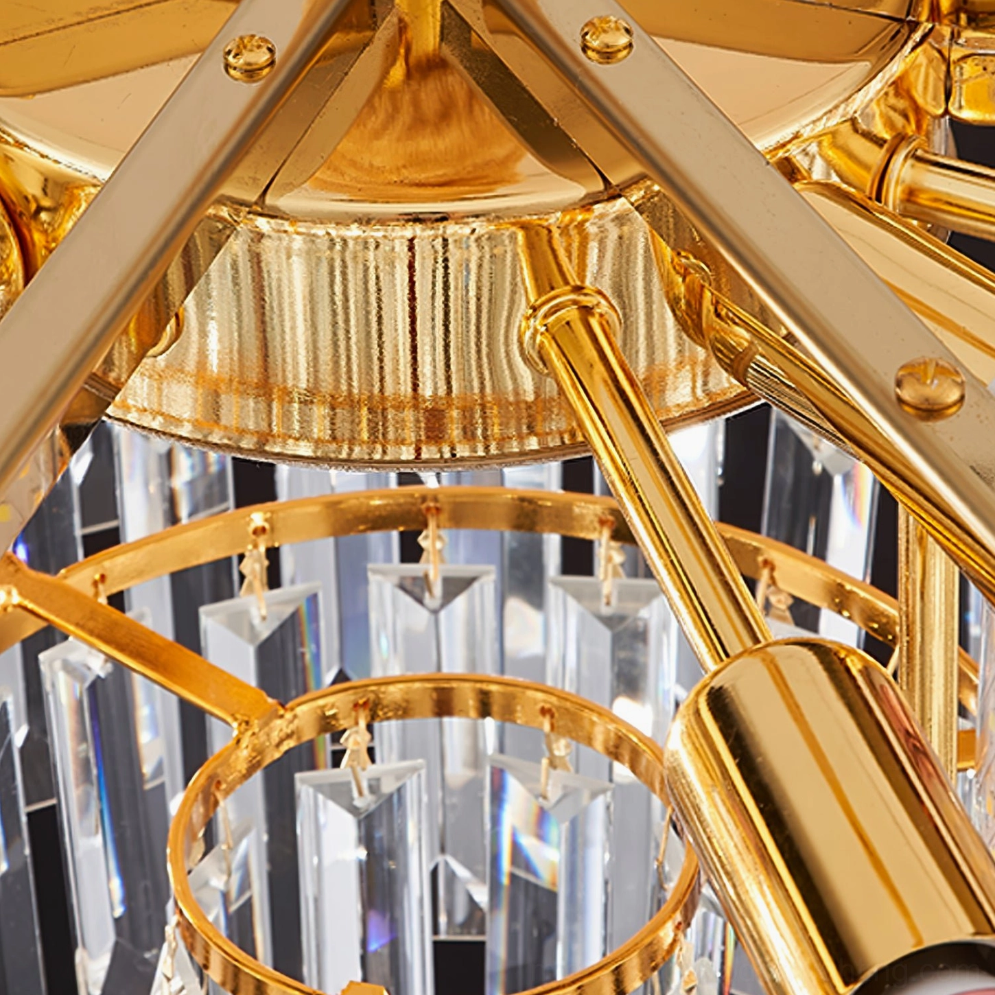 Crystal chandelier overhead view showing detailed crystal arrangement and gold canopy mounting