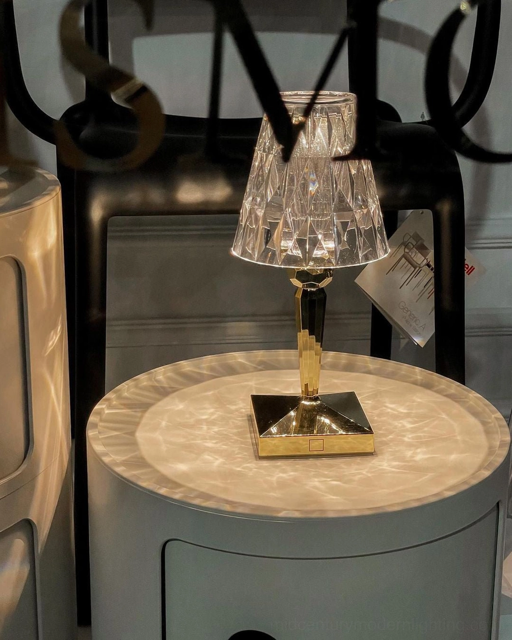 Crystal table lamp faceted acrylic design light refraction detail view