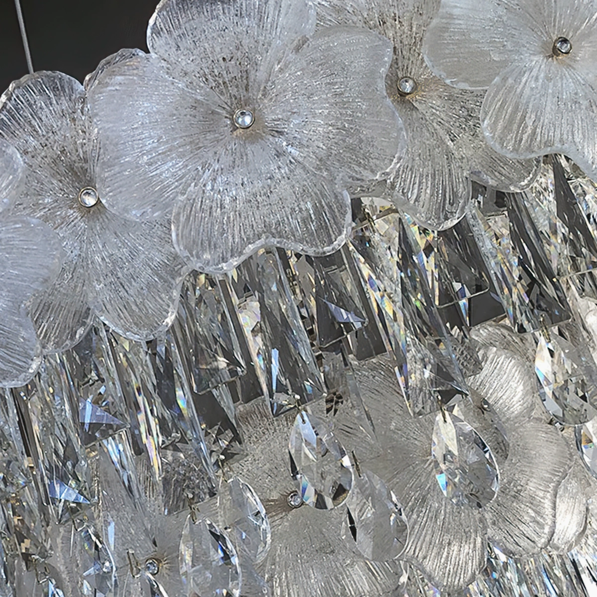 Crystal pendant droplets close-up macro photography showcasing transparent faceted crystal quality and light-refracting properties