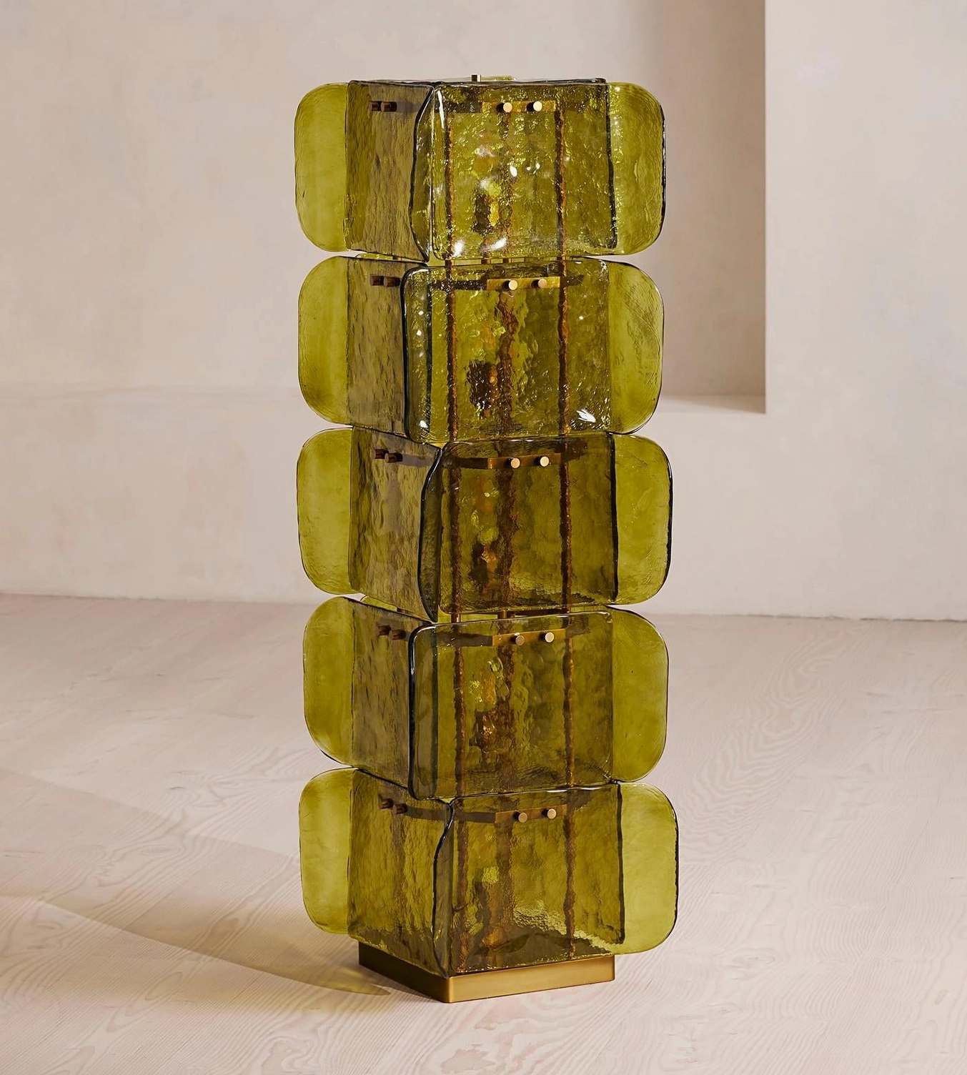 Cubo Totem in modern interior styling, paired sculptural floor lamps creating symmetrical focal point beside seating