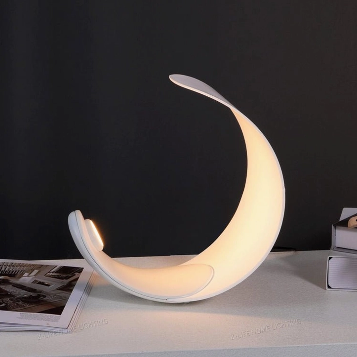 Curl LED table lamp glowing warm light dark backdrop minimalist modern accent