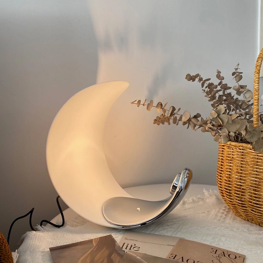 Curl crescent lamp side profile magazines tabletop contemporary minimalist design