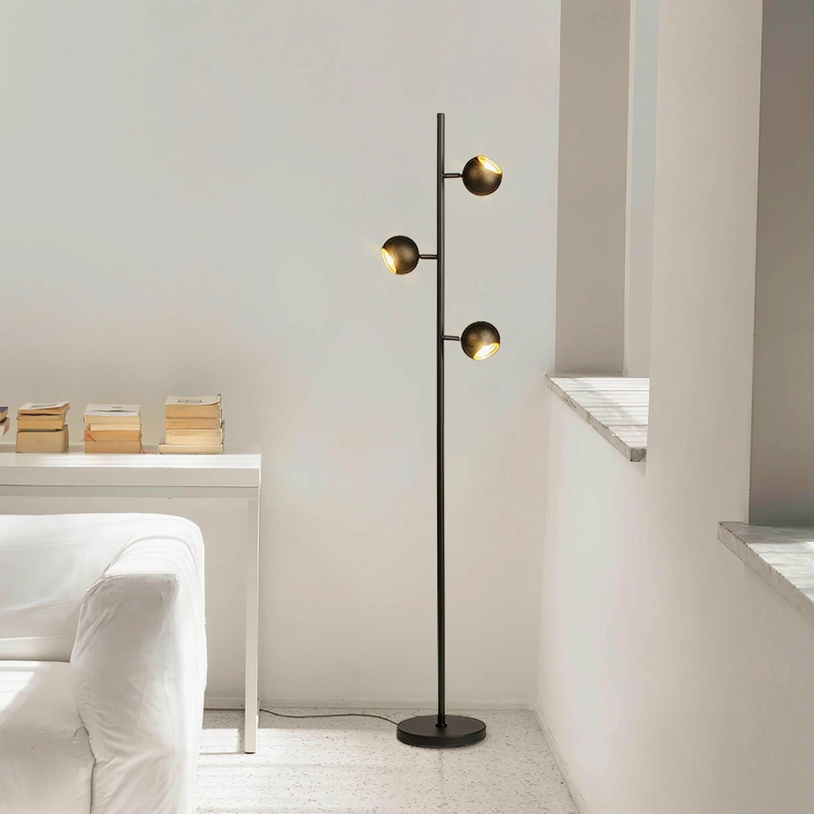 Modern Dakota floor lamp in minimalist Nordic living room setting with white walls and contemporary furniture