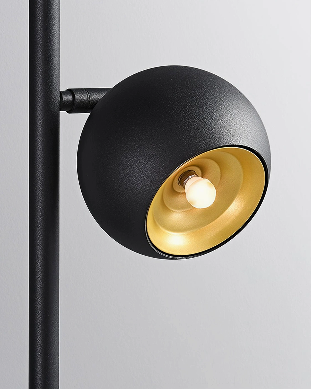 Dakota floor lamp head assembly detail showing metal pole connection and spherical shade design