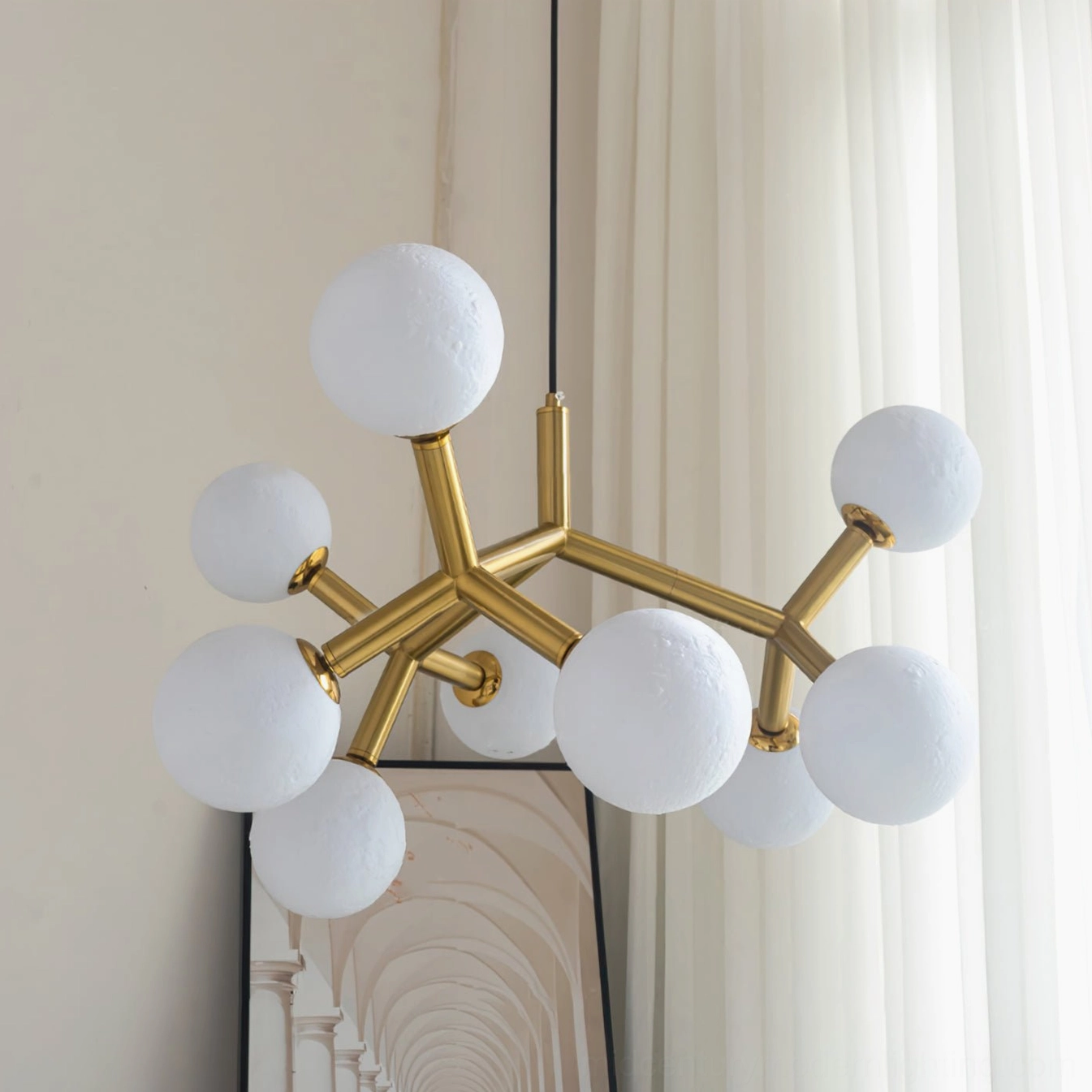 Dallas Planet Sputnik-style pendant with orbital moon glass configuration and polished brass framework