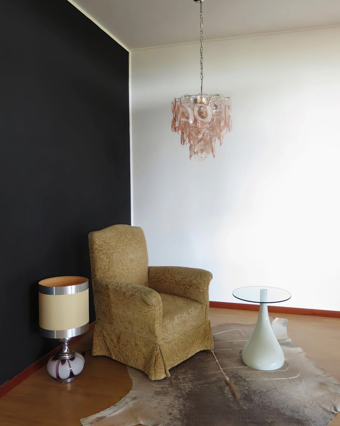 Delara pink glass chandelier installed in modern minimalist living room, showing practical room application and ambient lighting effect