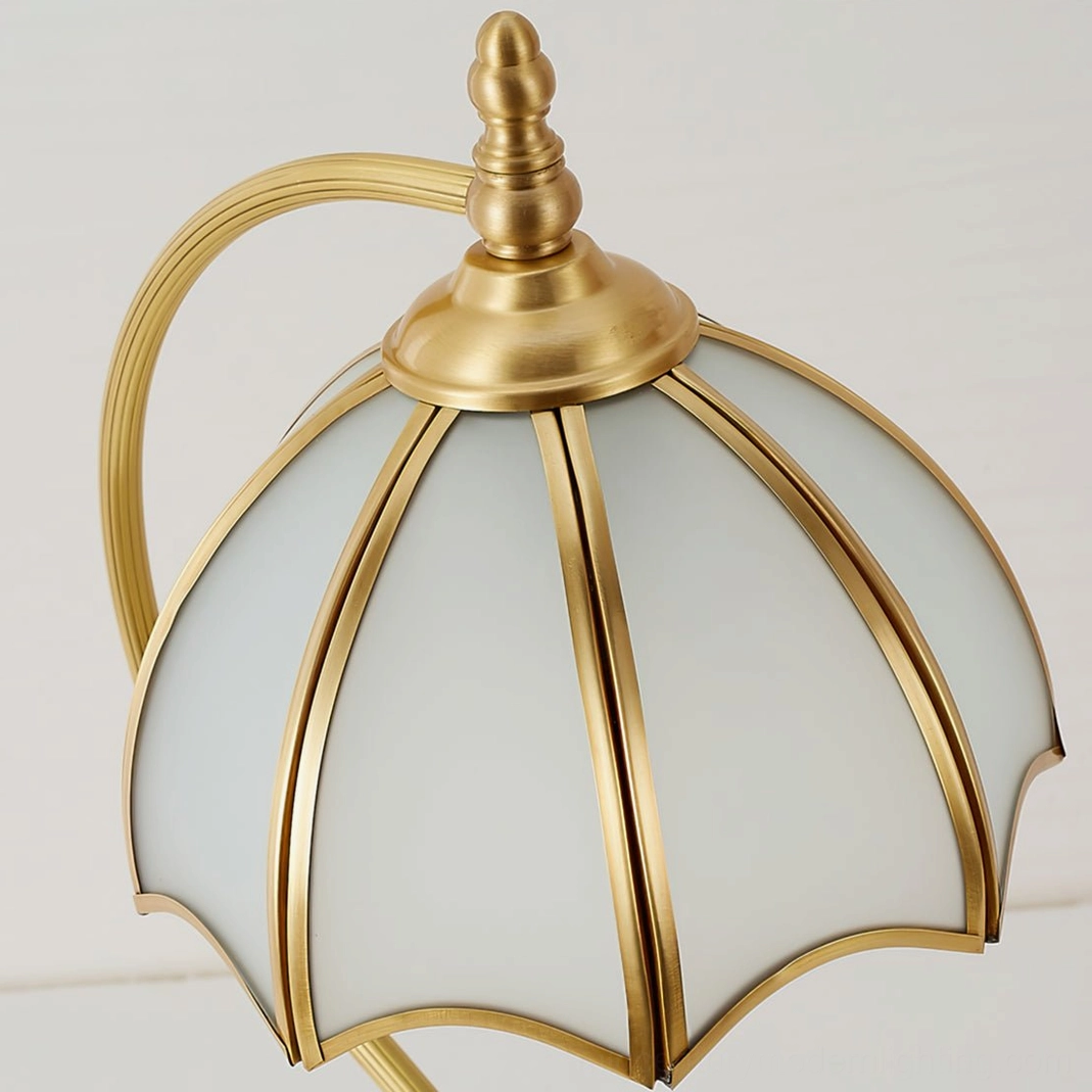Designer umbrella table lamp creating reading nook with soft focused illumination