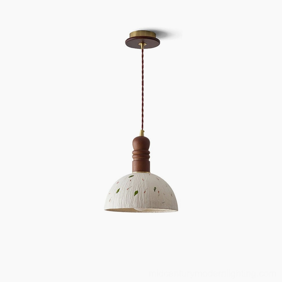 Diana pendant light showing handcrafted paper construction with natural leaf details and brass components