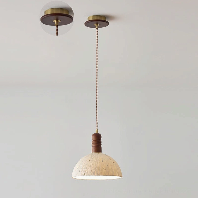 Medium Diana pendant light with walnut wood fixture and white paper shade with leaf motifs