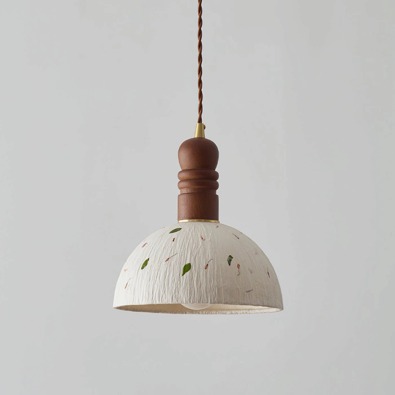 Diana pendant light in contemporary interior setting with minimalist aesthetic and warm ambient lighting