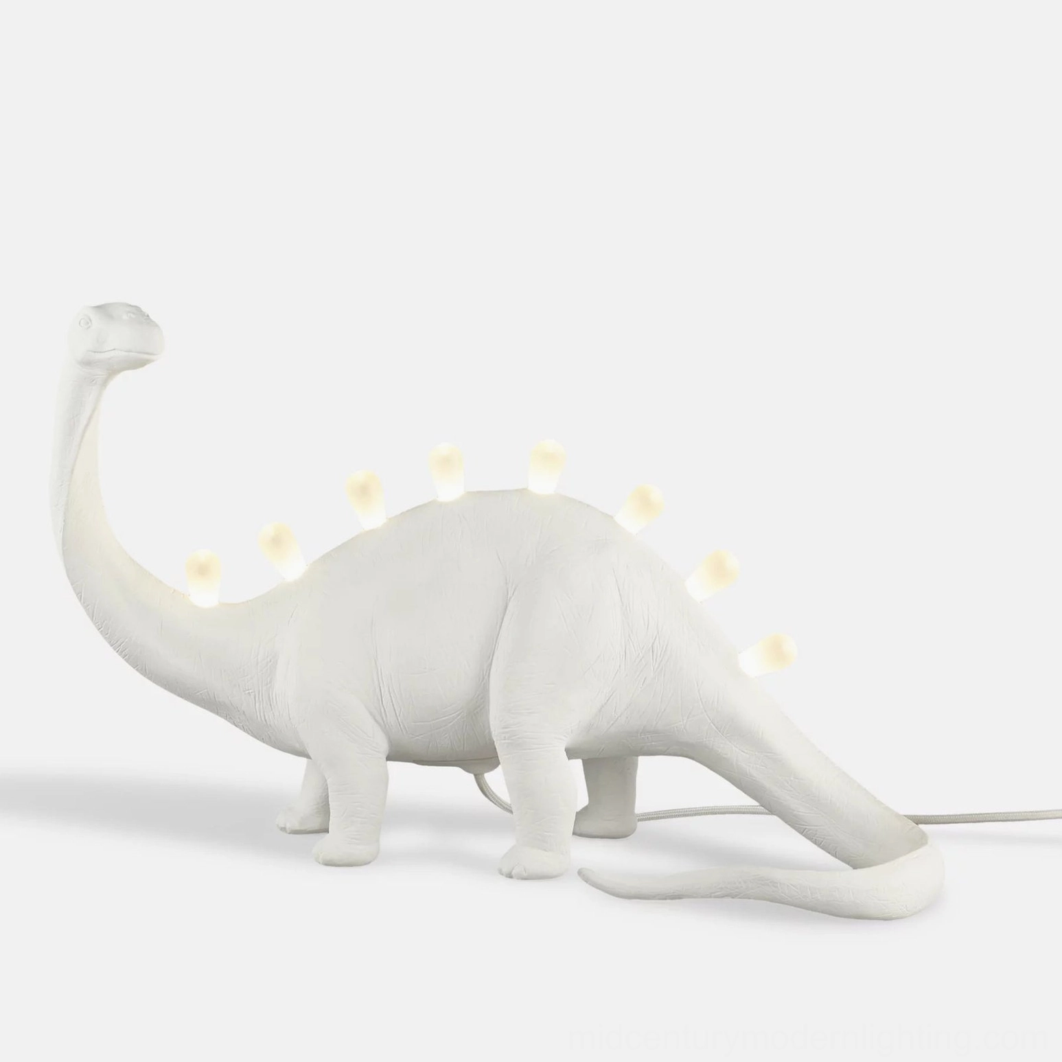 Dinosaur table lamp stylized with interior décor, warm LED glow in modern setting