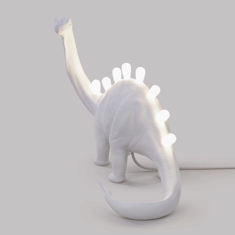 Dinosaur table lamp mounted perspective, LED lighting effect on sculptural resin form