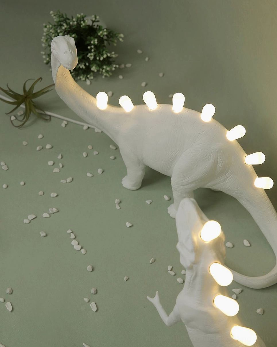 Dinosaur table lamp with push button switch, on/off control mechanism detail