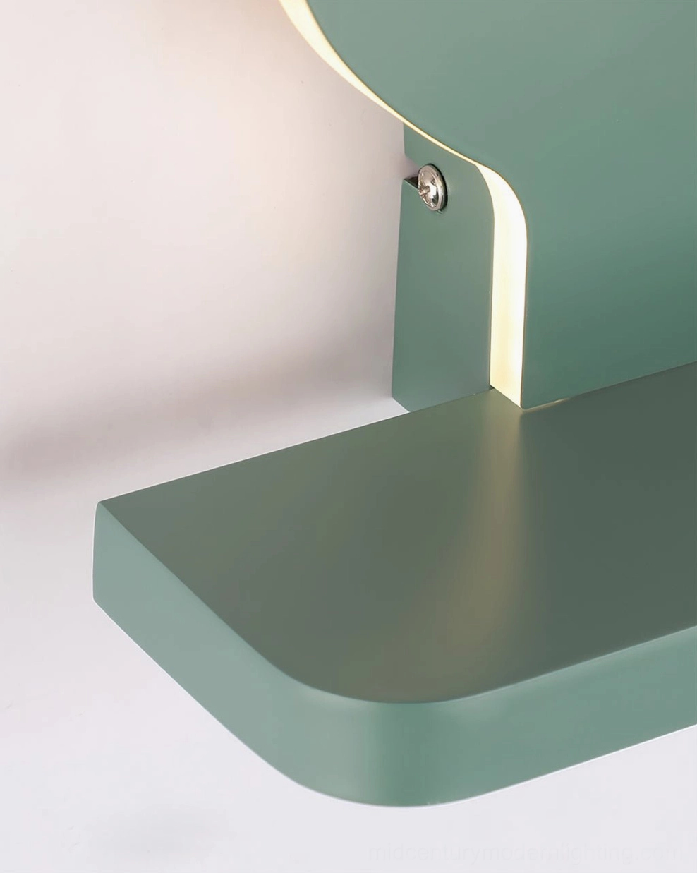 Bottom view of dinosaur wall lamp showing metal base, mounting hardware, and installation details