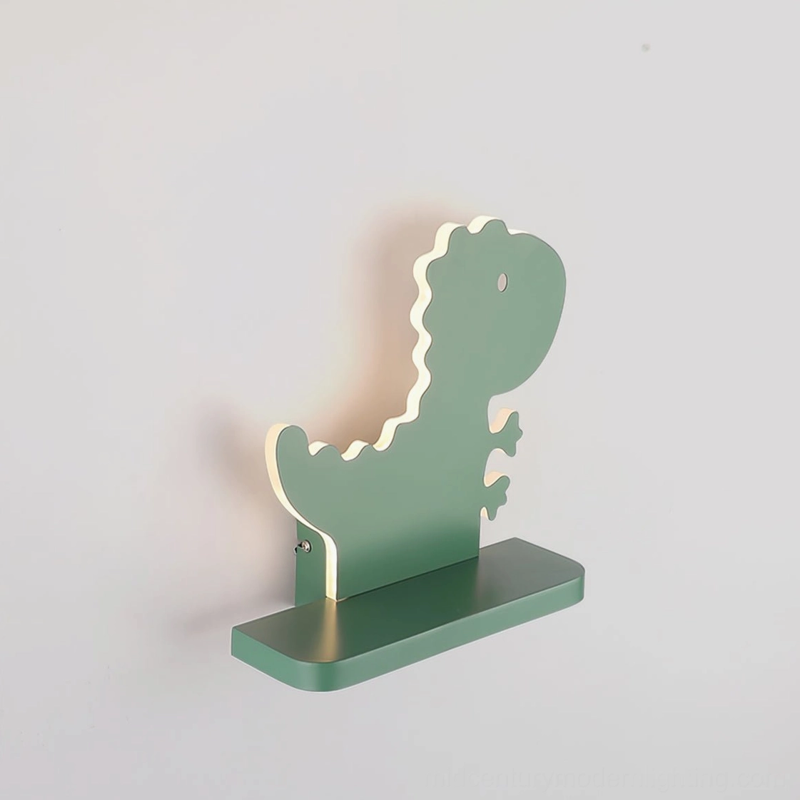 Side angle view of dinosaur wall lamp revealing integrated LED backlight strip and metal mounting profile